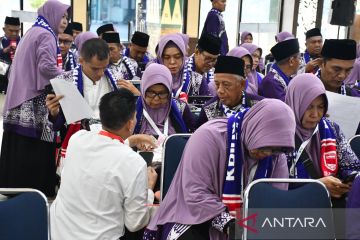 Kepulangan jamaah Kloter 1 Palembang ditunda, jadi besok pagi