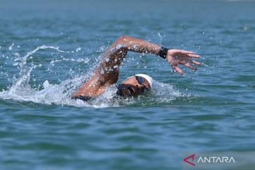 Perenang Indonesia Aflah Fadlan Prawira  juara renang perairan terbuka ASEAN 10K putra