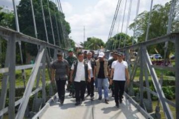 Pengerjaan fisik Jembatan Gantung Sepungguk Kampar selesai