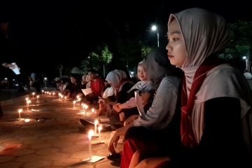 Aksi nyala lilin di Palu untuk dukungan pengesahan RUU PPRT