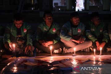 Aksi solidaritas pengendara ojek daring di Kendari