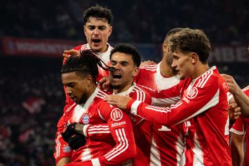 Bayern Muenchen menjaga jarak 11 poin dengan Borrusia Dortmund