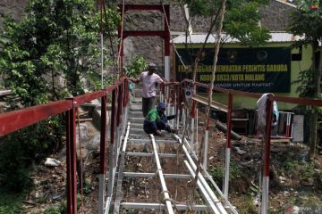 Progres pembangunan jembatan perintis garuda