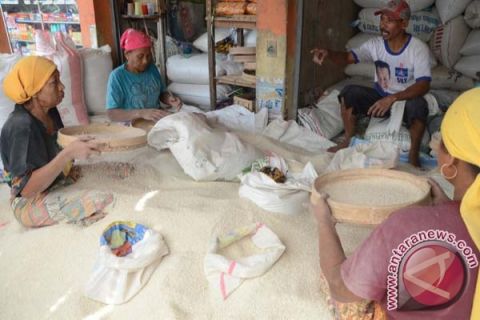 Buruh tampi beras 
