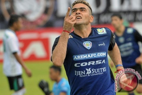 Arema menang