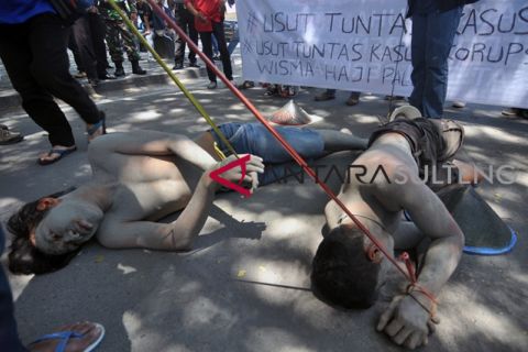 Demontrasi kasus korupsi