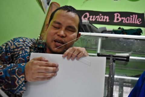 Alquran berhuruf braille