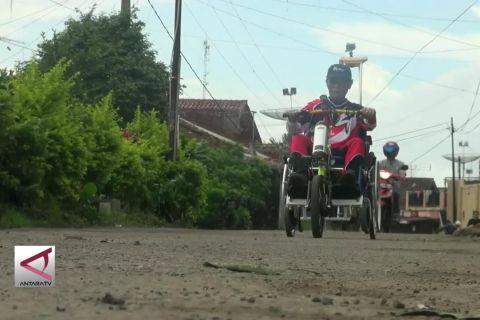 Motor penarik kursi roda