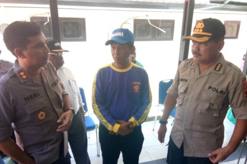 Penyerahan jenazah untuk dimakamkan secara massal