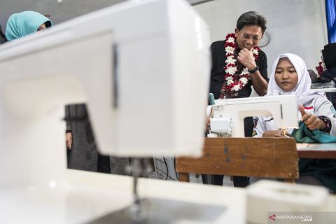 Program pendidikan Mega berbagi