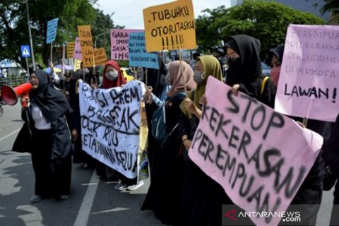 unjukrasa memperingati Hari Perempuan Internasional