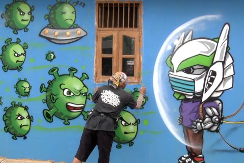 Edukasi virus corona melalui seni mural