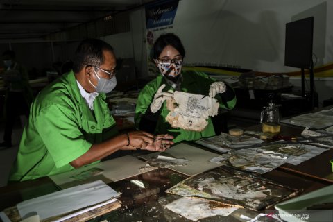 Restorasi arsip korban banjir