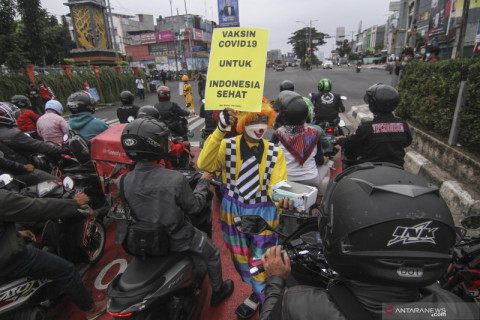 Kampanye ajakan vaksinasi COVID-19