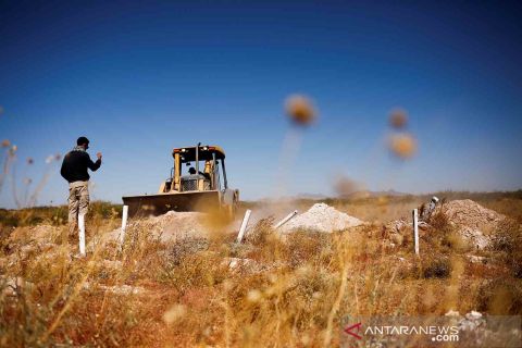 Penguburan massal korban kekerasan, pengabaian sosial dan COVID-19 di Meksiko