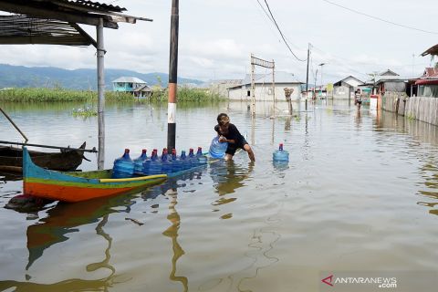 Banjir akibat air luapan Danau Limboto