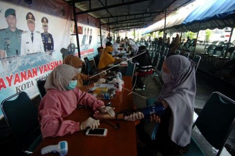 Vaksinasi COVID-19 warga yang terjaring razia