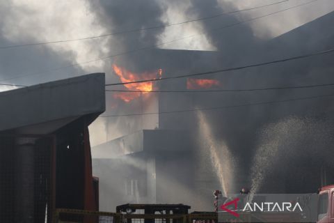 Kebakaran gudang JNE Depok