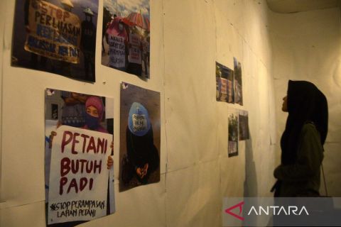 Pameran fotografi Hari Perempuan Internasional
