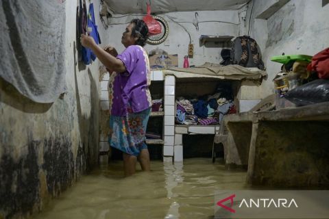 Banjir akibat luapan Kali Ciliwung di Kampung Meayu
