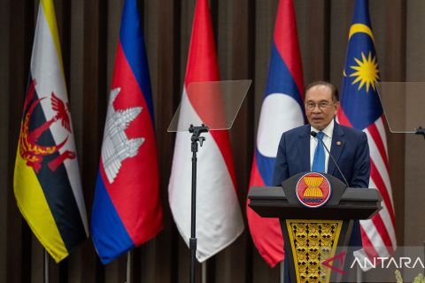 Malaysian Prime Minister Anwar Ibrahim delivers a speech at the ASEAN Secretariat
