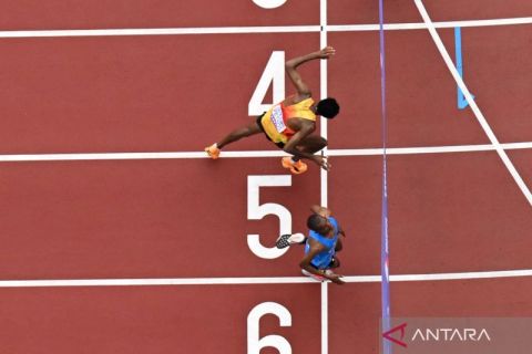 Melihat momen bersejarah terjadinya selisih finis terdekat dalam nomor maraton Kejuaraan Atletik Dunia