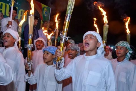 Ribuan masyarakat Tanjung Beringin meriahkan pawai obor