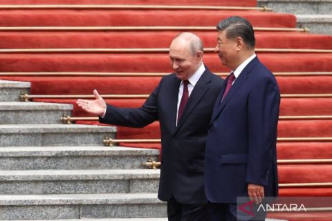 Sorotan dunia! Intip momen hangat Xi Jinping sambut Vladimir Putin di Beijing hari ini
