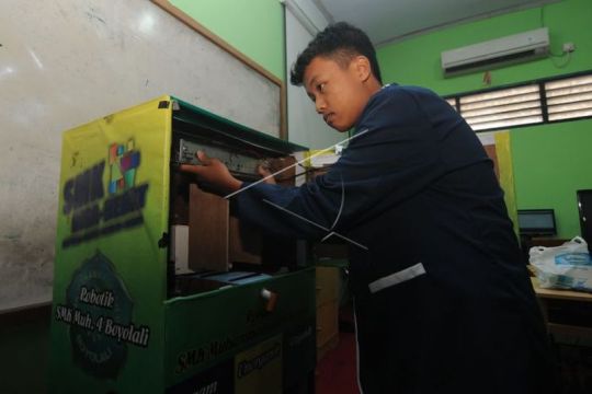 Inovasi alat pemilah sampah berkonsep ATM Page 2 Small