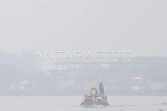 Berangkat sekolah melewati kawasan kabut asap