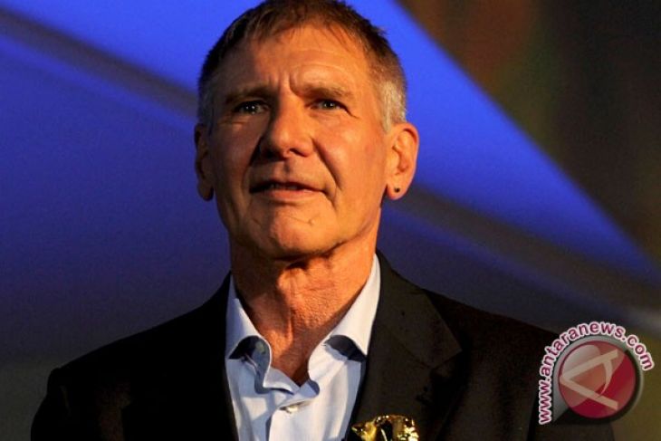 President Yudhoyono talks about Indonesian environmental policy to Harrison Ford