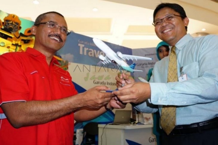 Sinergi Telkomsel dan Garuda Indonesia