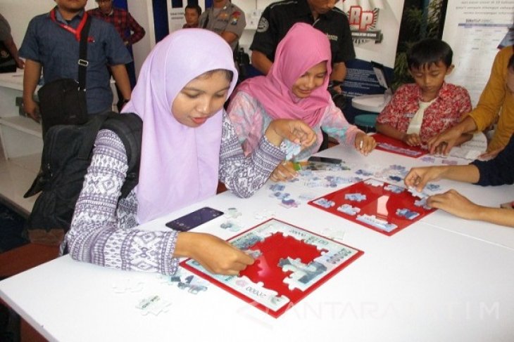 Permainan Puzzle dari Uang