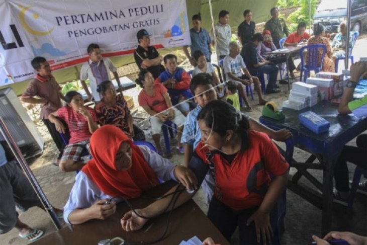 PEMERIKSAAN KESEHATAN KORBAN BANJIR