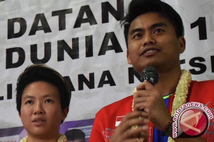 Tontowi pensiun dari bulu tangkis, ini alasannya