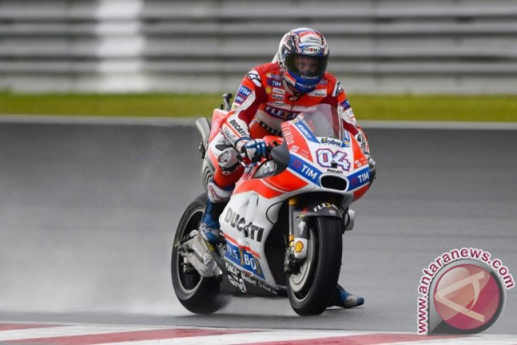 Andrea Dovizioso rajai lintasan basah GP Valencia
