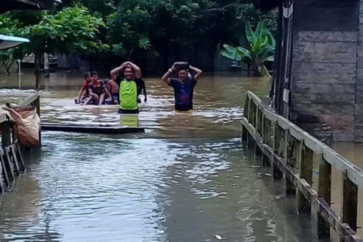 Banjir Akibat Luapan Sungai Teweh