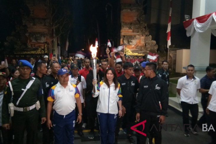 Di Tampaksiring, obor Asian Games disambut