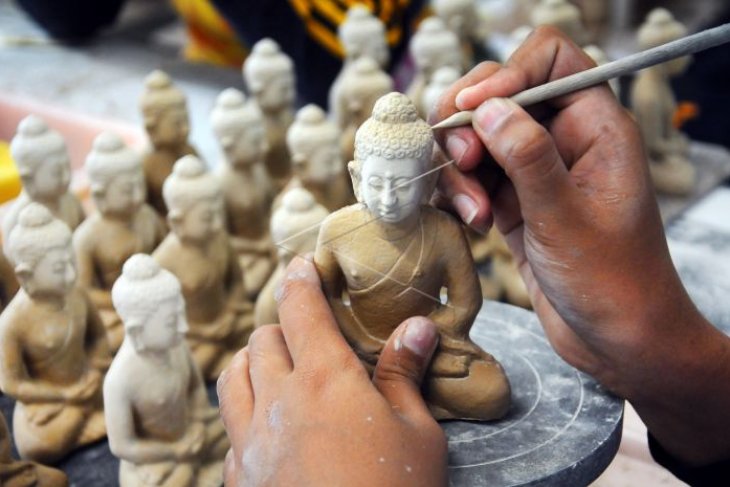 Kerajinan miniatur patung Buddha