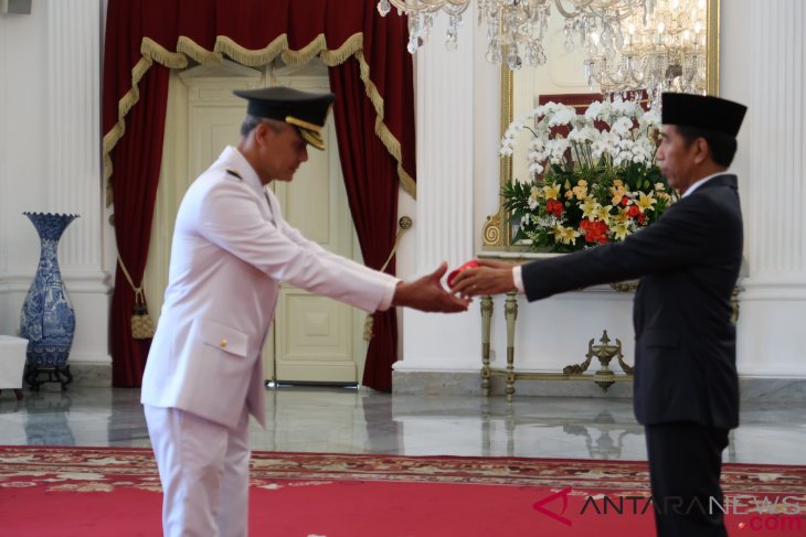 President Jokowi installs nine governors