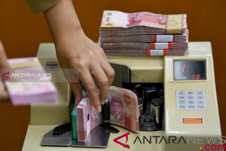 Rupiah menguat seiring kebijakan Bank Sentral AS pertahankan suku bunga