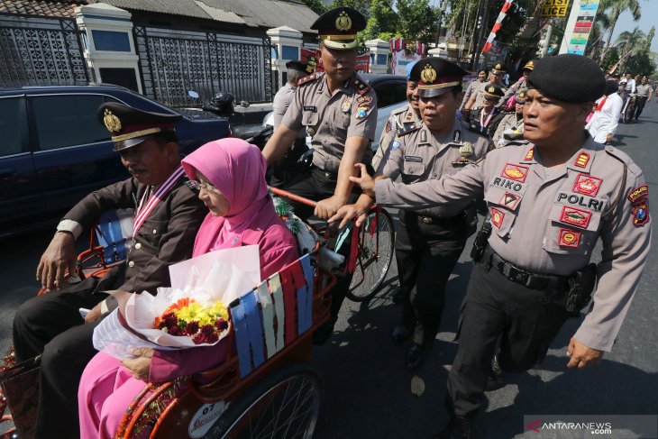 Pawai purna tugas polisi