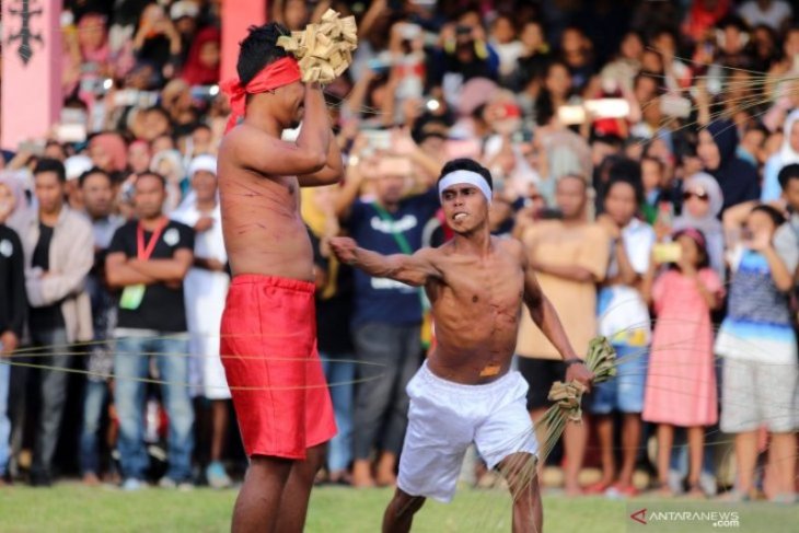 Tradisi Pukul Sapu negeri Mamala