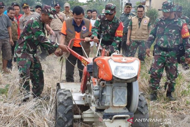 Hand tractor modification a solution to avoid land fire in HSS