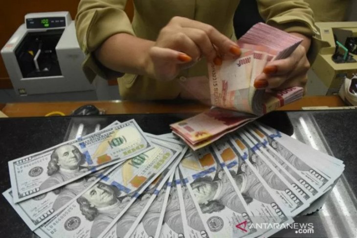 Rupiah kembali menguat tembus level psikologis Rp14.000