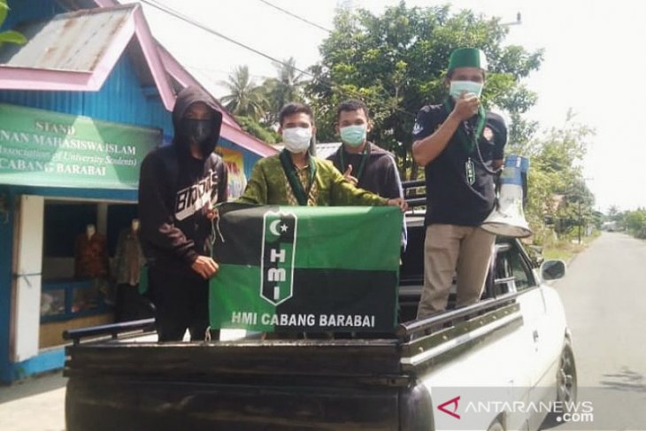 HMI Cabang Barabai keliling desa sosialiasi cegah Corona