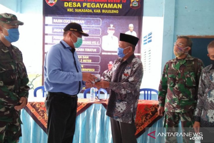 Undiksha-Kodim Buleleng bantu masker ke