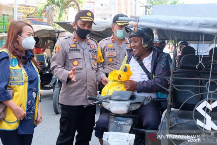 Sinergitas LCM-Polres Tanjungbalai, ratusan pengandara dapat bahan pangan dan panganan siap saji