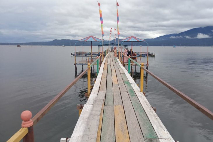 Berwisata di pantai Indah Koto Petai