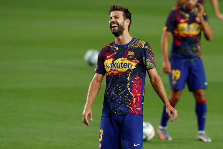 Pique termasuk empat pemain Barca yang diperpanjang kontraknya